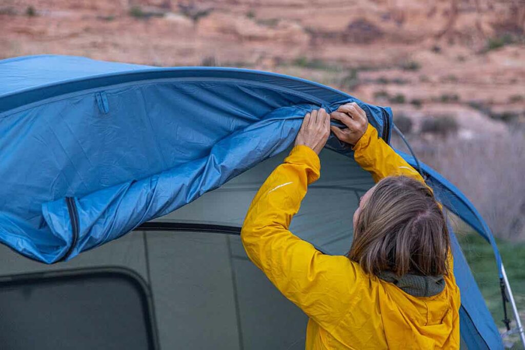 Camping-tent-(rolling-back-rainfly-on-REI-Co-op-Skyward-4)